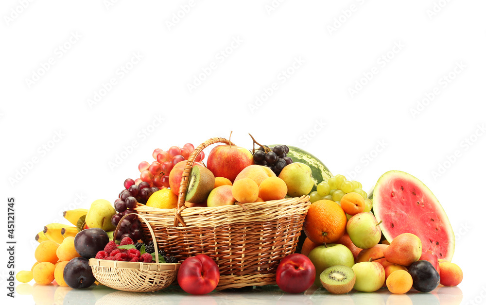 Assortment of exotic fruits and berries in baskets isolated Assortment of exotic fruits and berries in baskets isolated