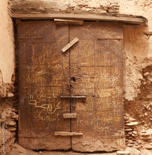 Ancient door in the El Badi Palace in Marrakech, Morocco.