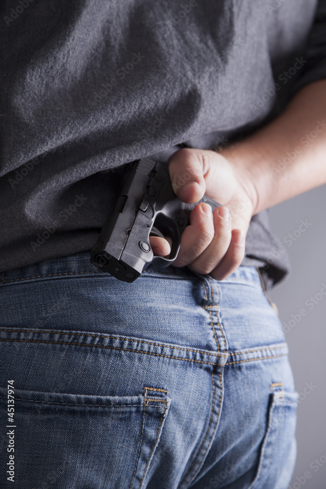 Fototapeta premium Hiding a Weapon