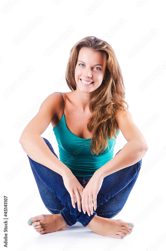 Happy student sitting on the floor