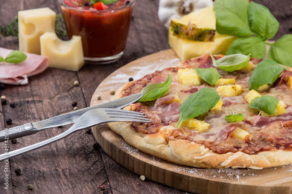 Fresh baked Pizza with Ham and Pineapples