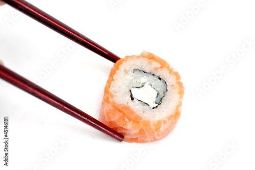 sushi with chopsticks isolated