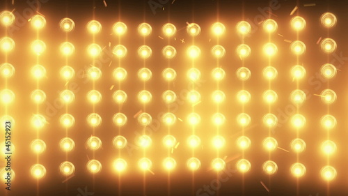 Bright flood lights background with particles and glow photo