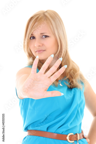 young woman showing his hand signaling stop