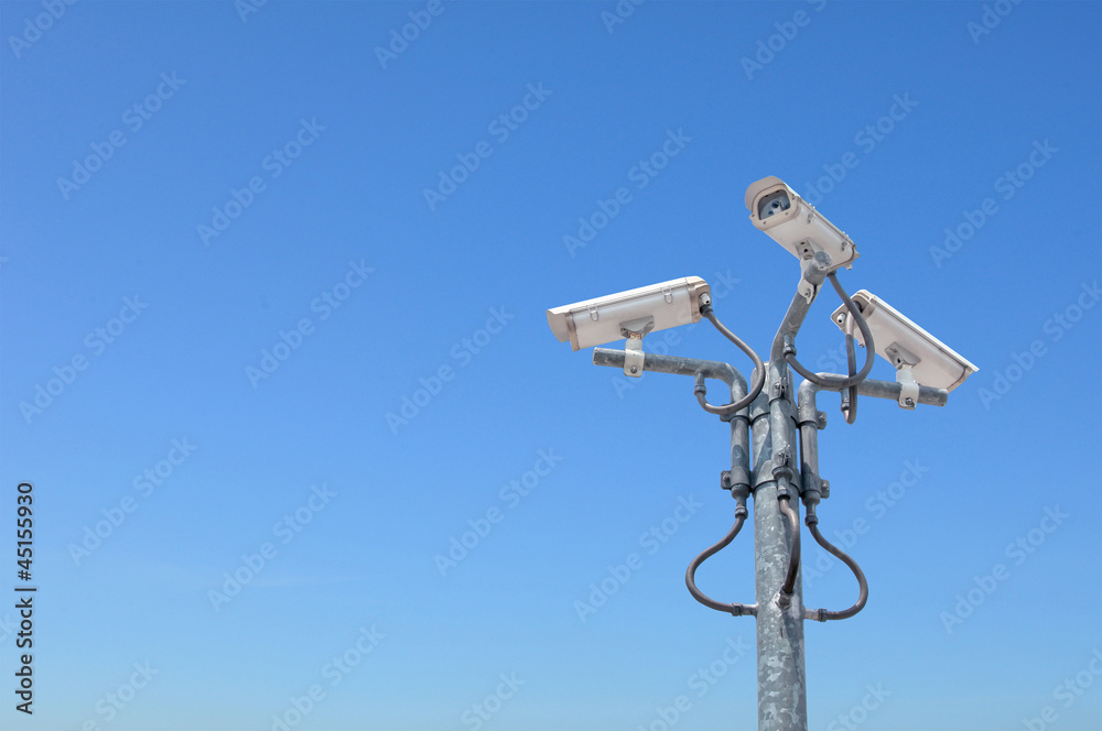 Three outdoor security cameras cover multiple angles. Three outdoor security cameras cover multiple angles.