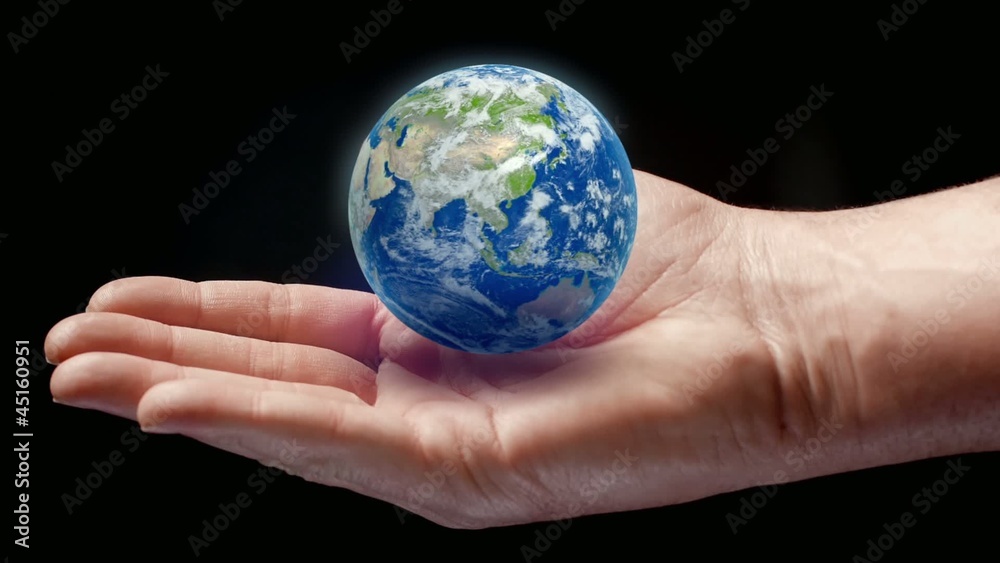 Earth rotating and vanishing in hand Earth rotating and vanishing in hand