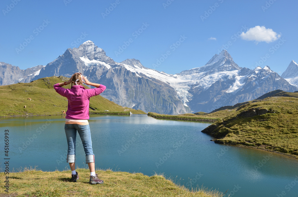 Traveler against Swiss Alps
