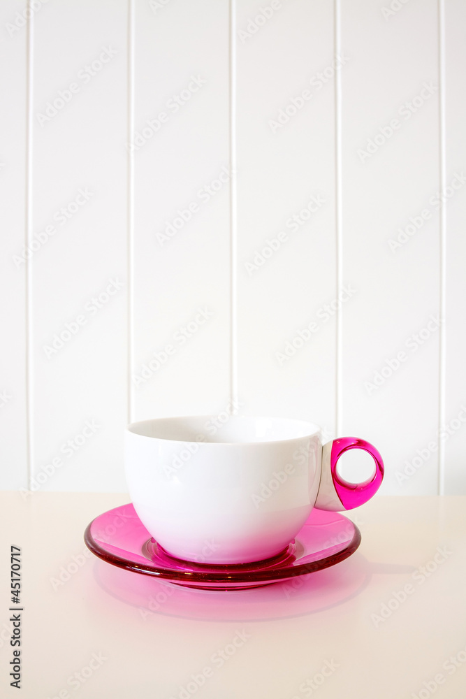 Obraz premium Colorful a cup of coffee on the table