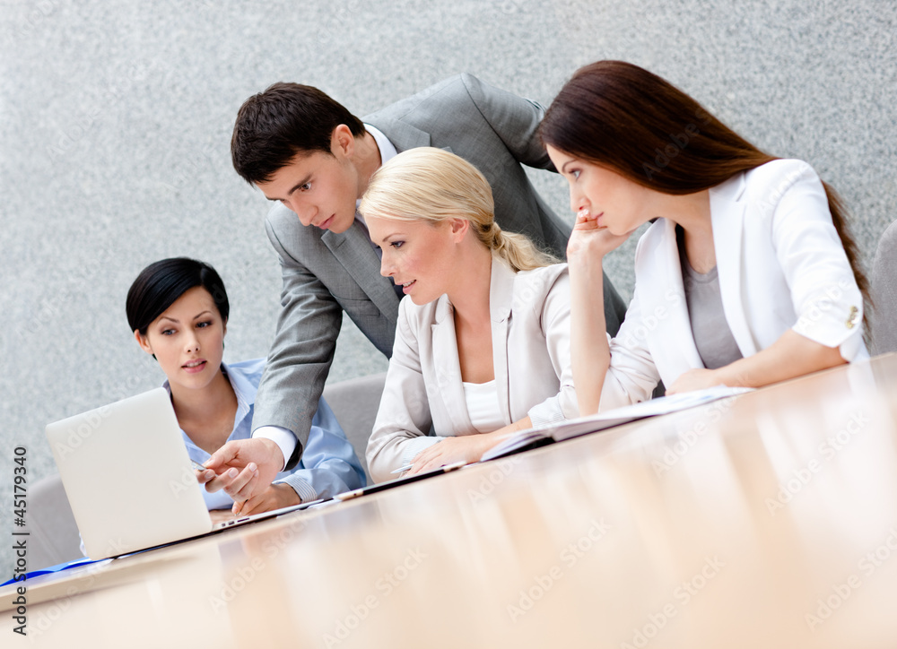 Business people discuss something at the meeting Business people discuss something at the meeting