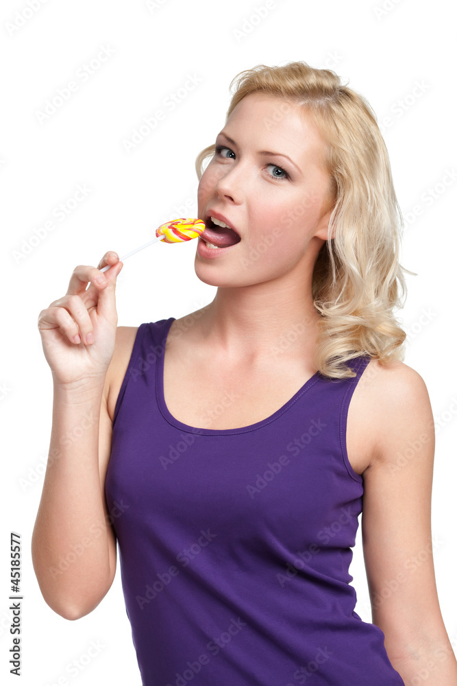 Woman licking sweet, isolated on white