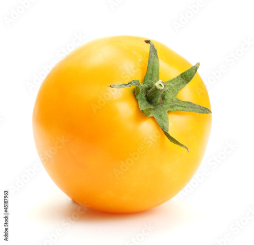 yellow tomato isolated on white