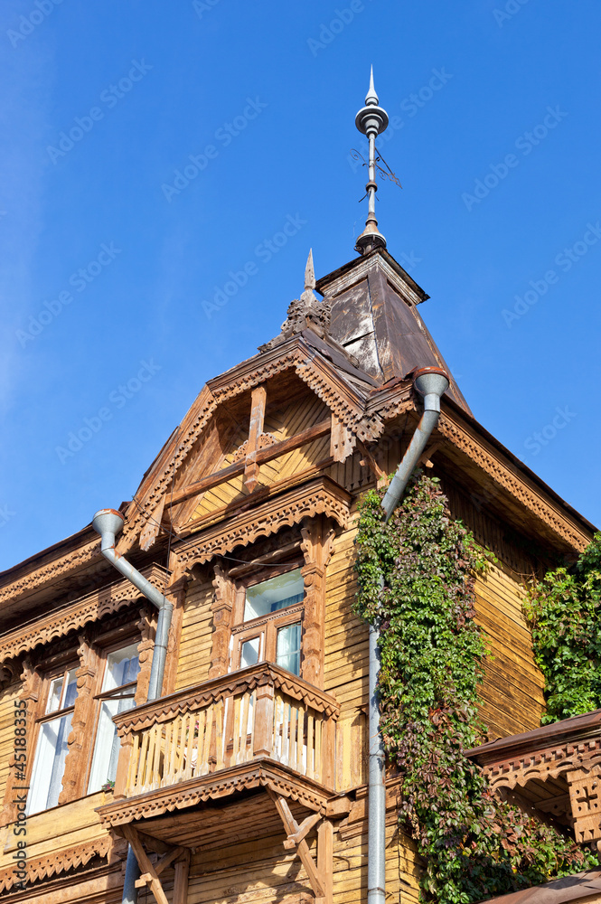 Old wooden house over blue sky