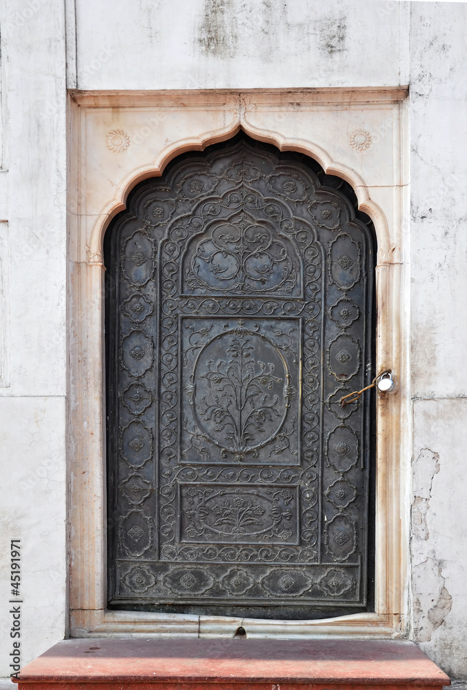 The locked door of the Moti Masjid or Pearl Mosque