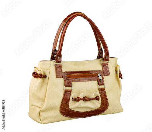 Beautiful woman handbag in light brown isolated
