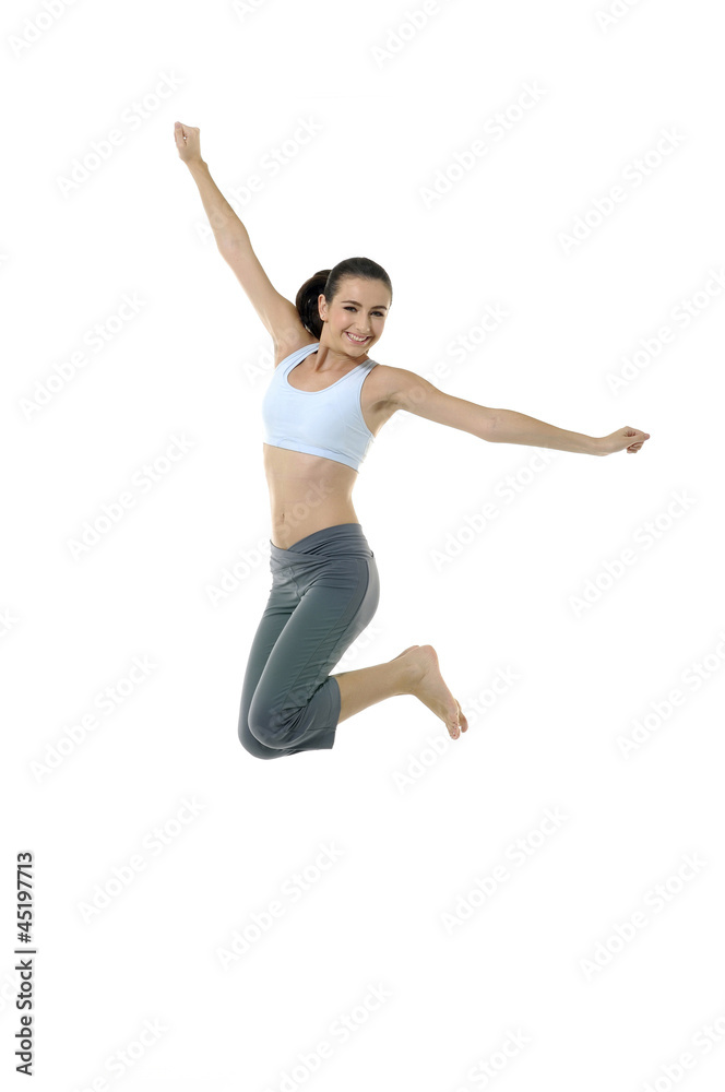Portrait of a pretty girl exercising *-jumping