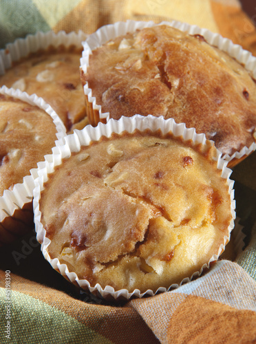 Freshly baked cornbread muffins with cheddar cheese photo