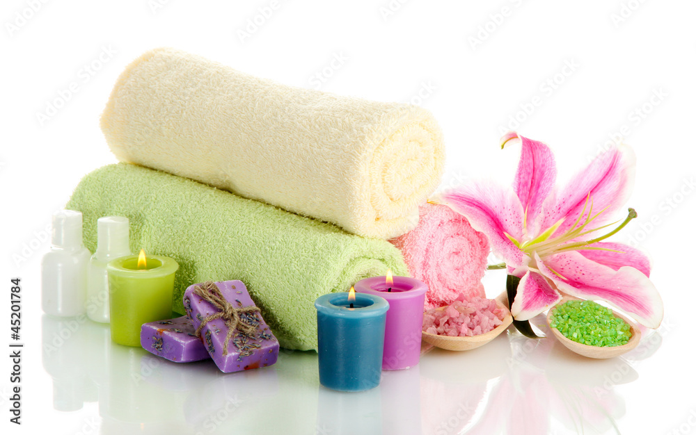 towels with lily, aroma oil, candles, soap and sea salt towels with lily, aroma oil, candles, soap and sea salt