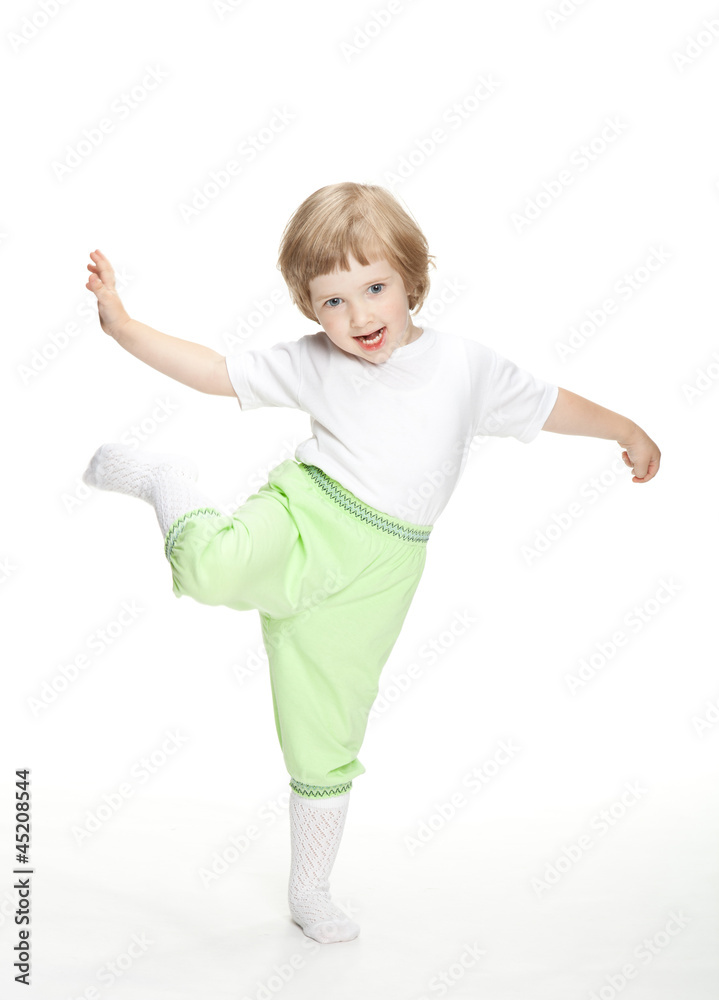 Happy playful little girl jumping and dancing Happy playful little girl jumping and dancing