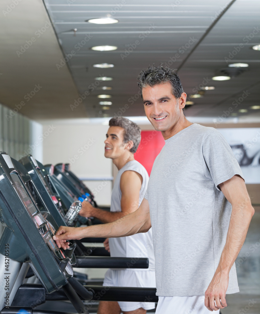 Men Running On Treadmill Men Running On Treadmill