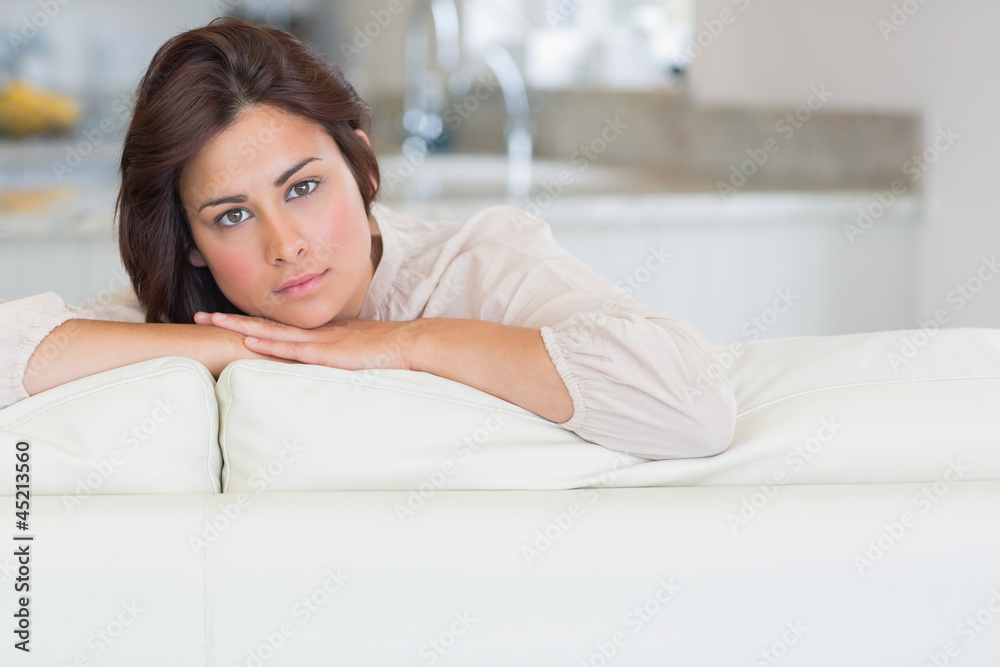 Brunette relaxing on the couch Brunette relaxing on the couch