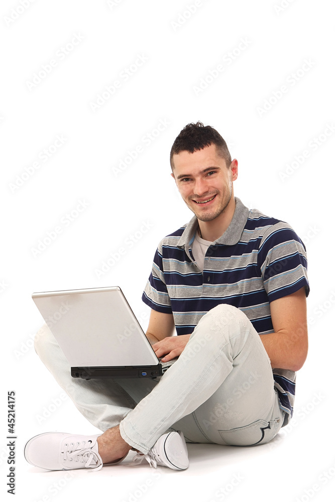 Young happy businessman with laptop, isolated on white