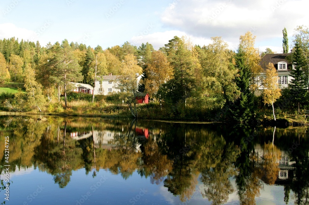 Fototapeta premium Landscape and villas by a dam
