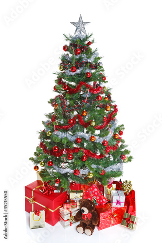 Decorated Christmas tree isolated.