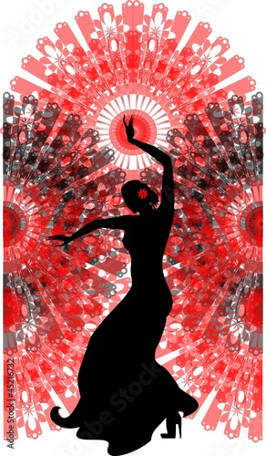 Silhouette of flamenco dancer with a fan