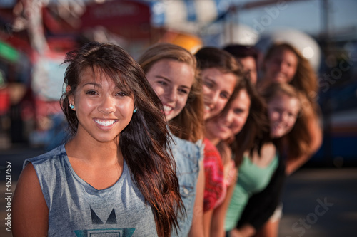 Row of Cute Girls at Theme Park