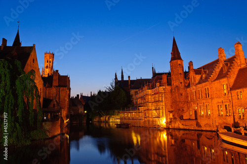 View from the Rozenhoedkaai at the Old Town of Bruges at dusk