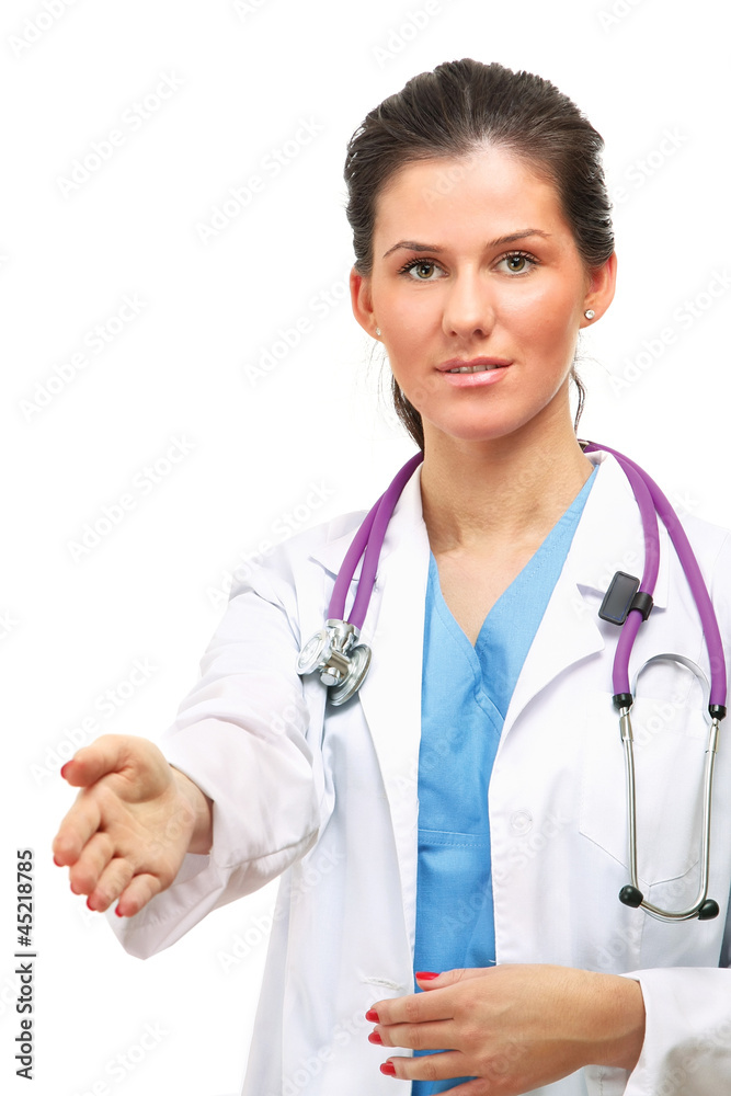 A female doctor giving her hand for a handshake A female doctor giving her hand for a handshake