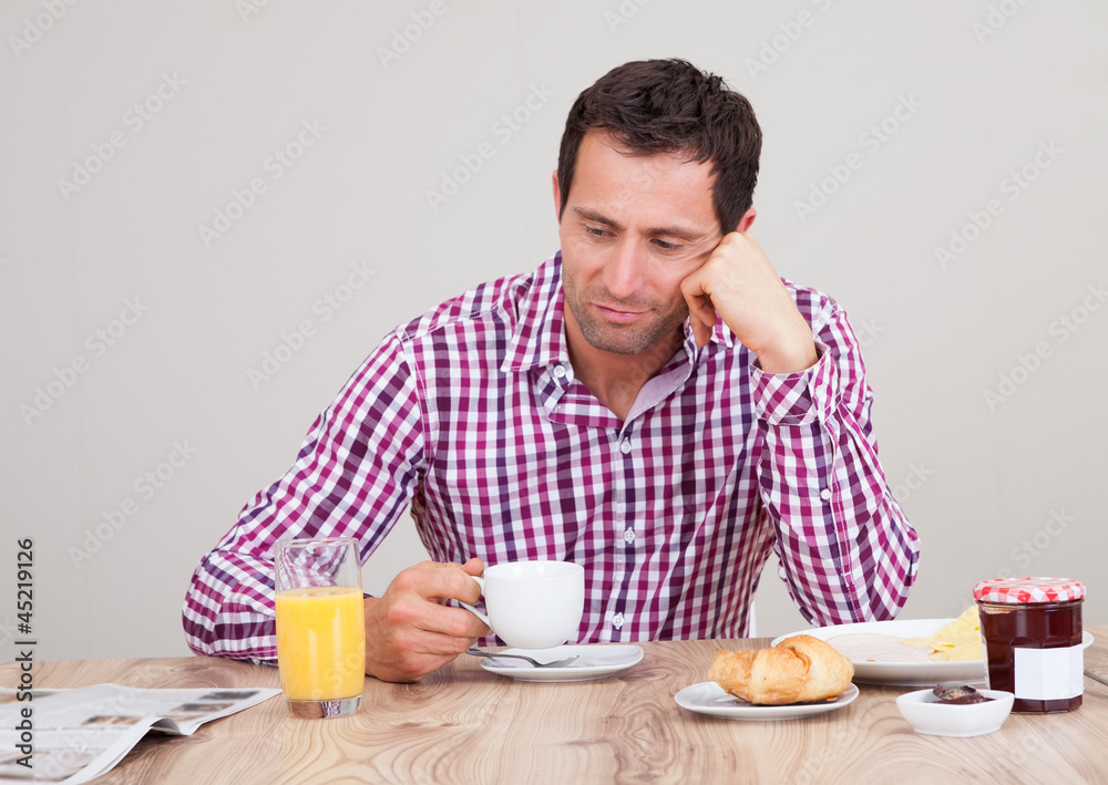 Portrait Of Young Man Having Breakfast Portrait Of Young Man Having Breakfast