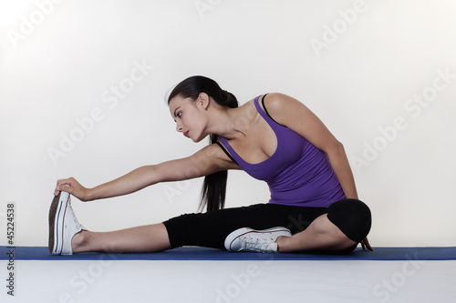 stretching exercises on a mat