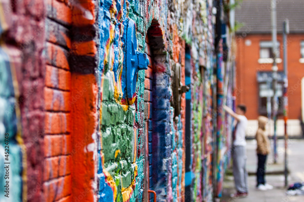 Graffiti wall with painters