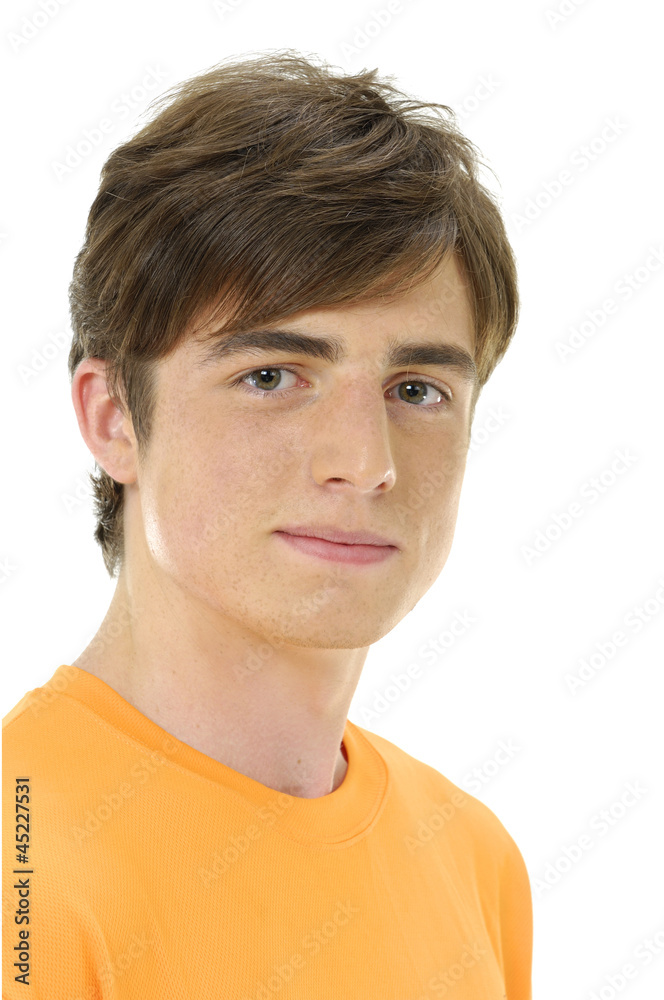 Close up handsome young man standing against white Close up handsome young man standing against white