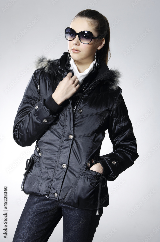 fashion model in autumn/winter clothes posing fashion model in autumn/winter clothes posing