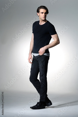 Full body fashion male profile portrait isolated