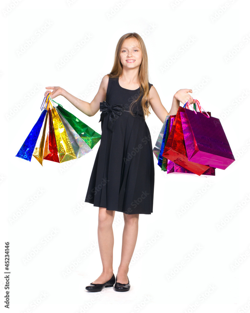 beautiful girl in elegant black dress with many color bag