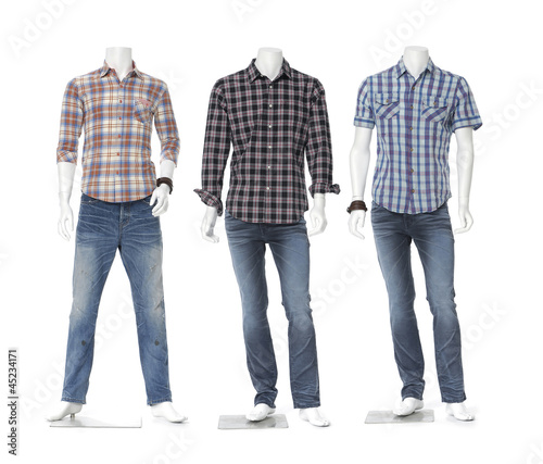 three male mannequin dressed in jeans with striped shirt