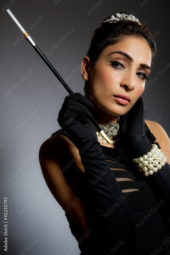 Stylish young woman in black dress retro style Stylish young woman in black dress retro style