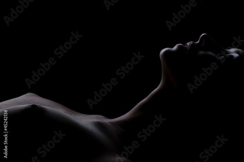 Laying woman with her eyes closed