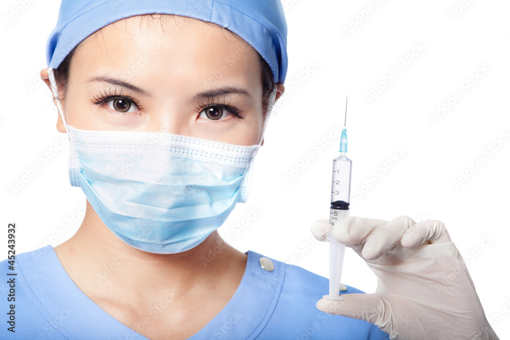 surgery woman doctor with syringe needle surgery woman doctor with syringe needle