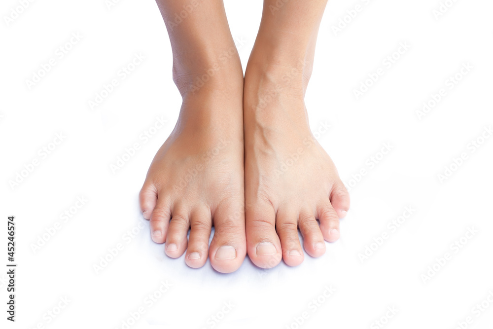 Fototapeta premium Beautiful women foot on background white