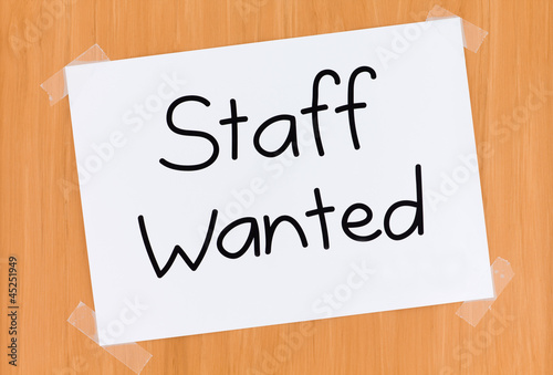 Sign on the Door Saying Staff Wanted