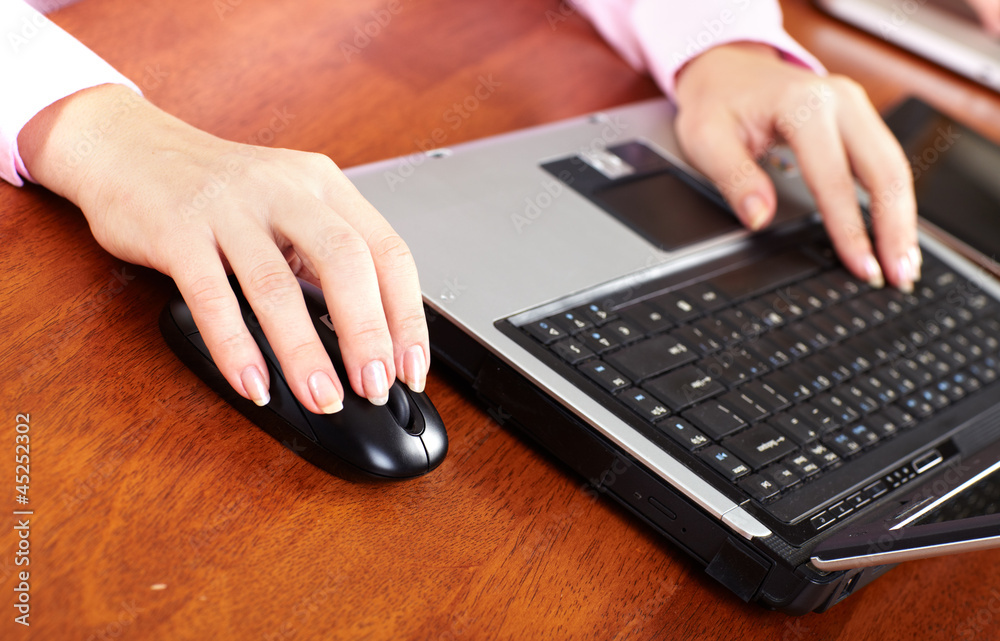 Hand with a computer mouse. Hand with a computer mouse.