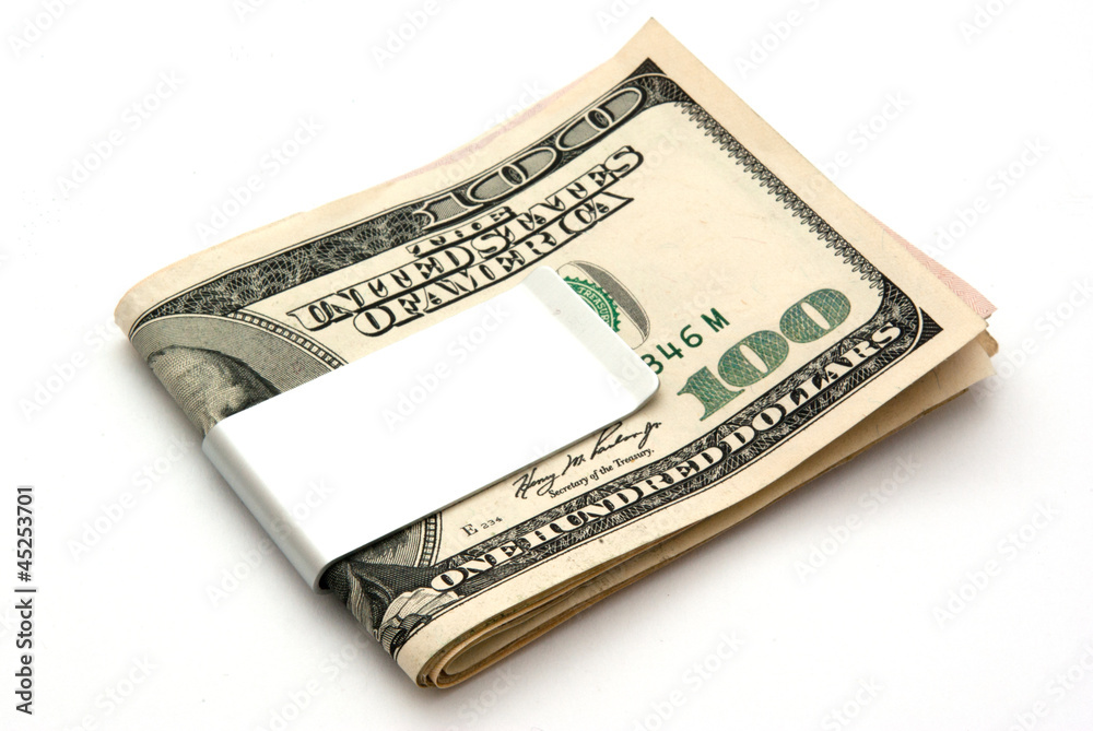 dollars in money clip Stock Photo | Adobe Stock