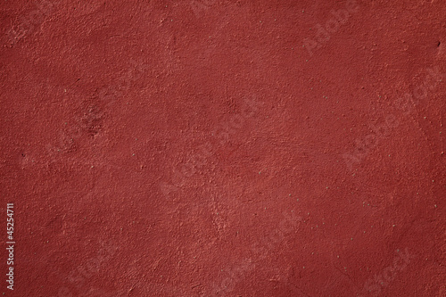 Old plaster wall texture background in Ochre City Marrakech, Mor