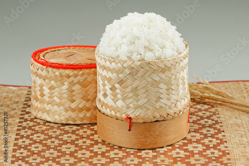 Thai sticky rice in bamboo wooden old fashioned style box photo