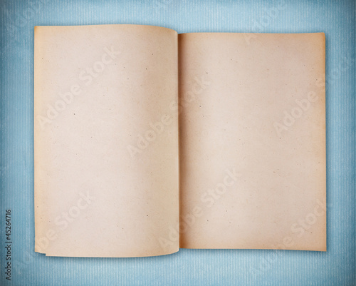 Bild auf Leinwand Blank vintage notebook on blue vintage paper