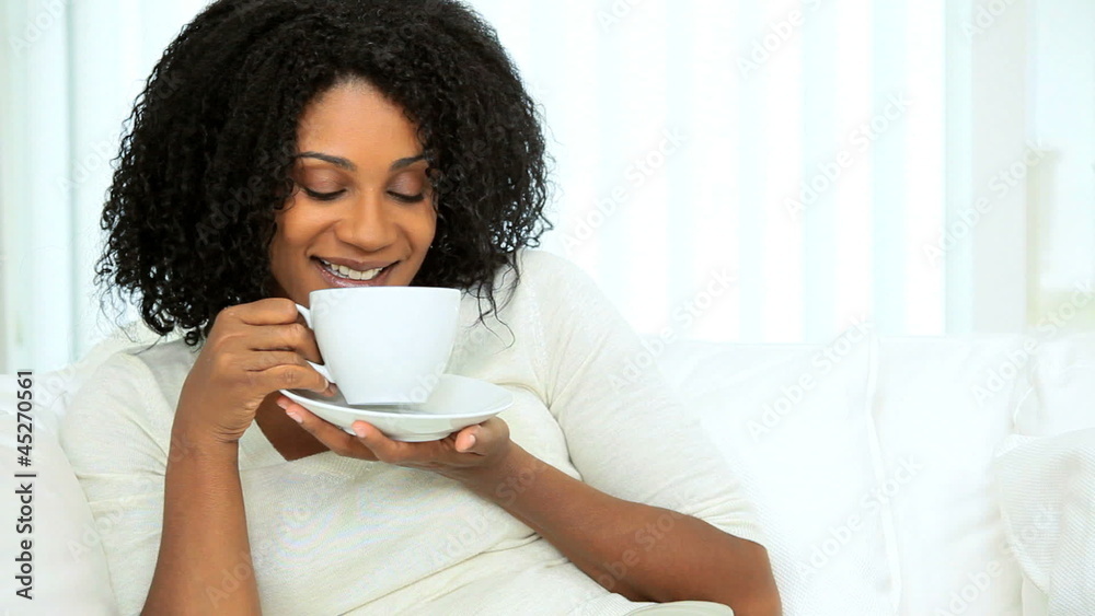 African American Female Drinking Coffee African American Female Drinking Coffee